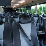 Luxury Bus With Leather Black and Grey Seats with Seatbelts